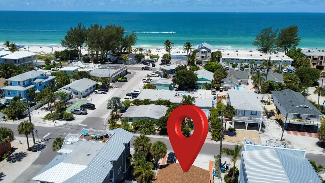 Aerial view with the Happy Turtle duplex marked steps from the Gulf beach, Bradenton Beach