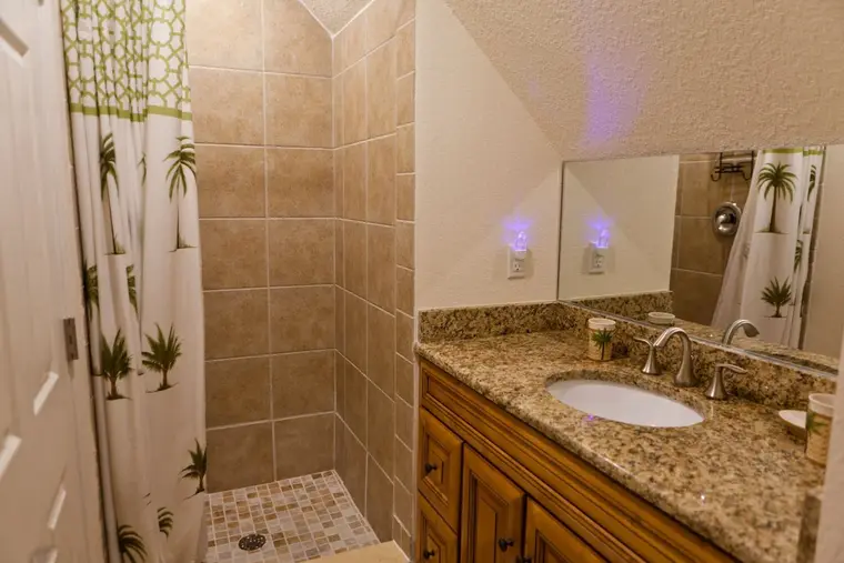 Second bathroom with walk-in shower and vanity, Happy Island Cottage