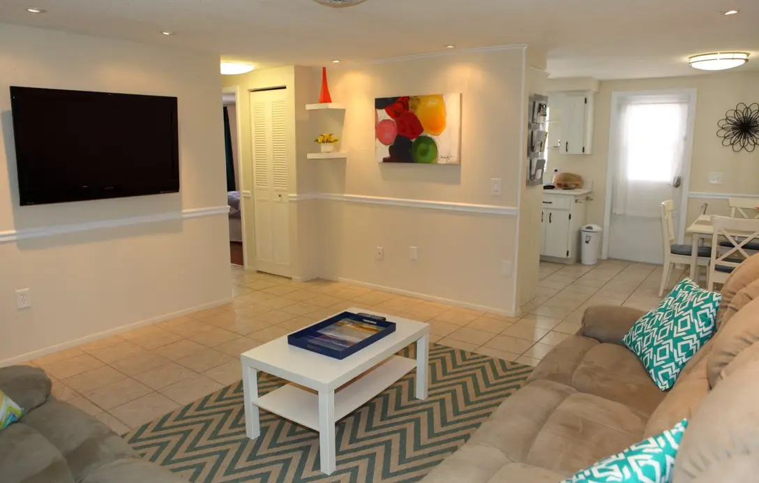 Open living room looking toward the kitchen and dining nook, Happy Turtle B
