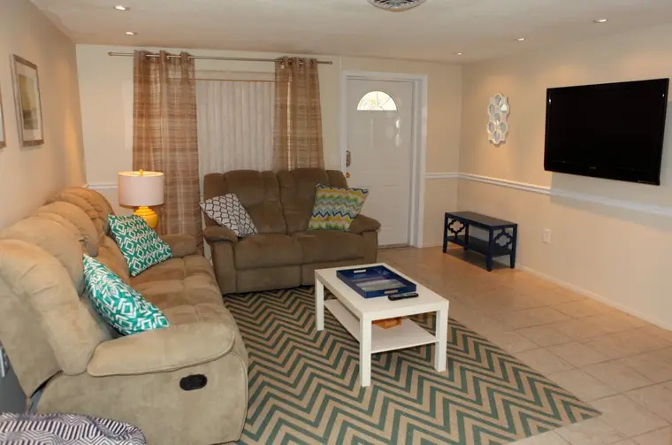 Living room seating beside the front entry door, Happy Turtle B